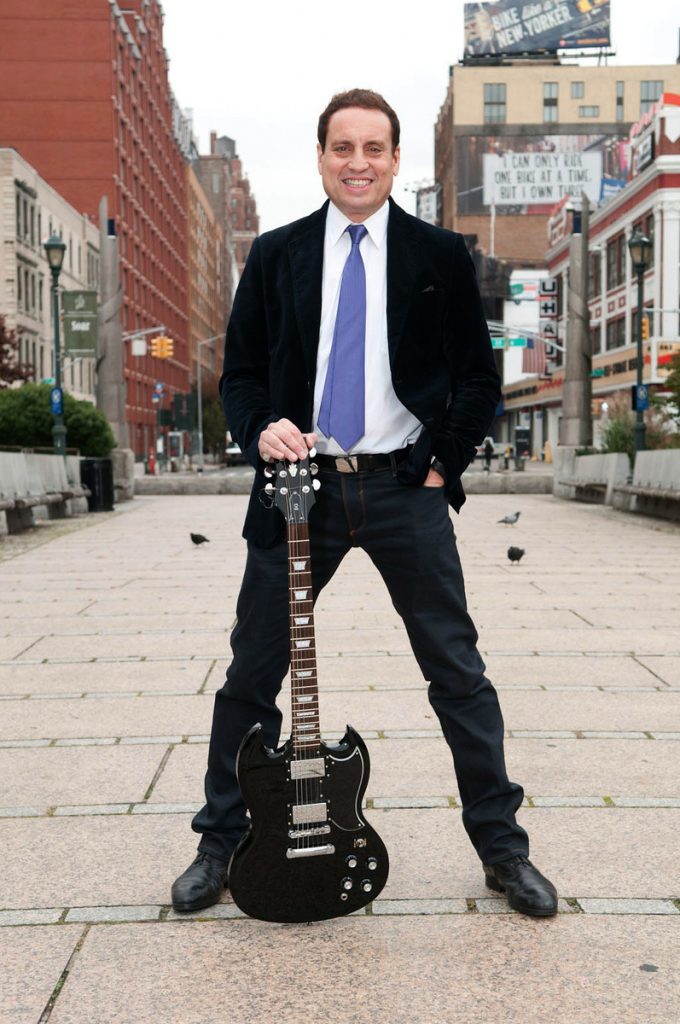 Dr. Jeff the NYC HouseCall Vet with his guitar